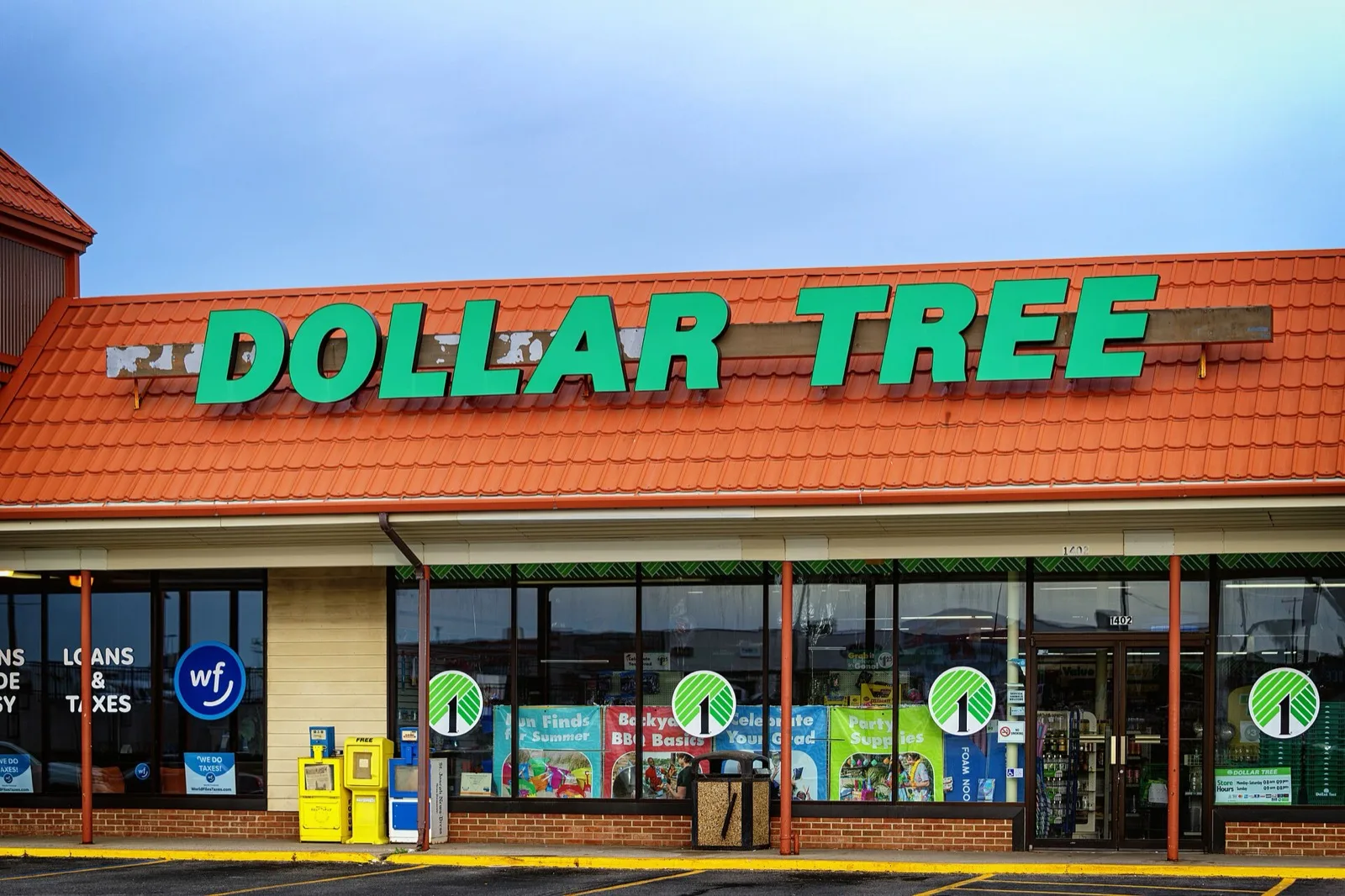 A Dollar Tree storefront in a strip shopping center